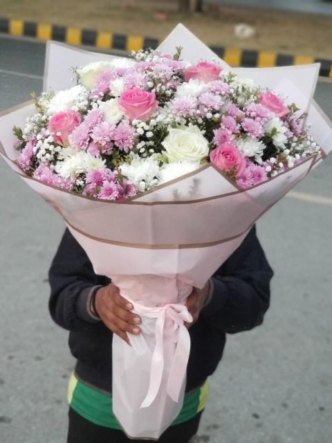 Chrysanthemum, Roses and Babe Breath Bouquet .